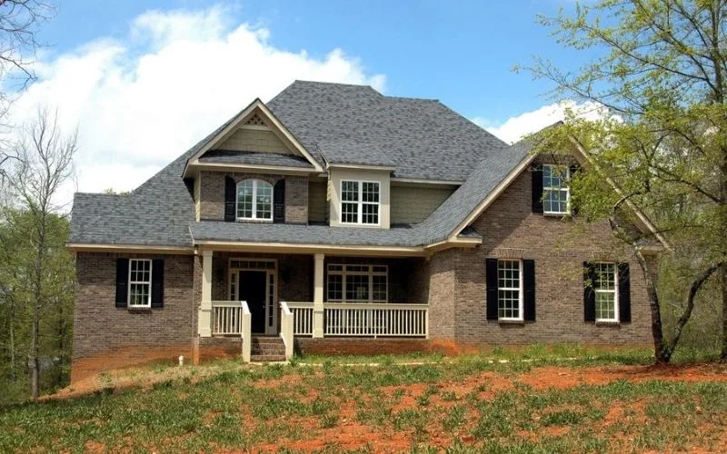 House exterior showing roofline, gutters and porch